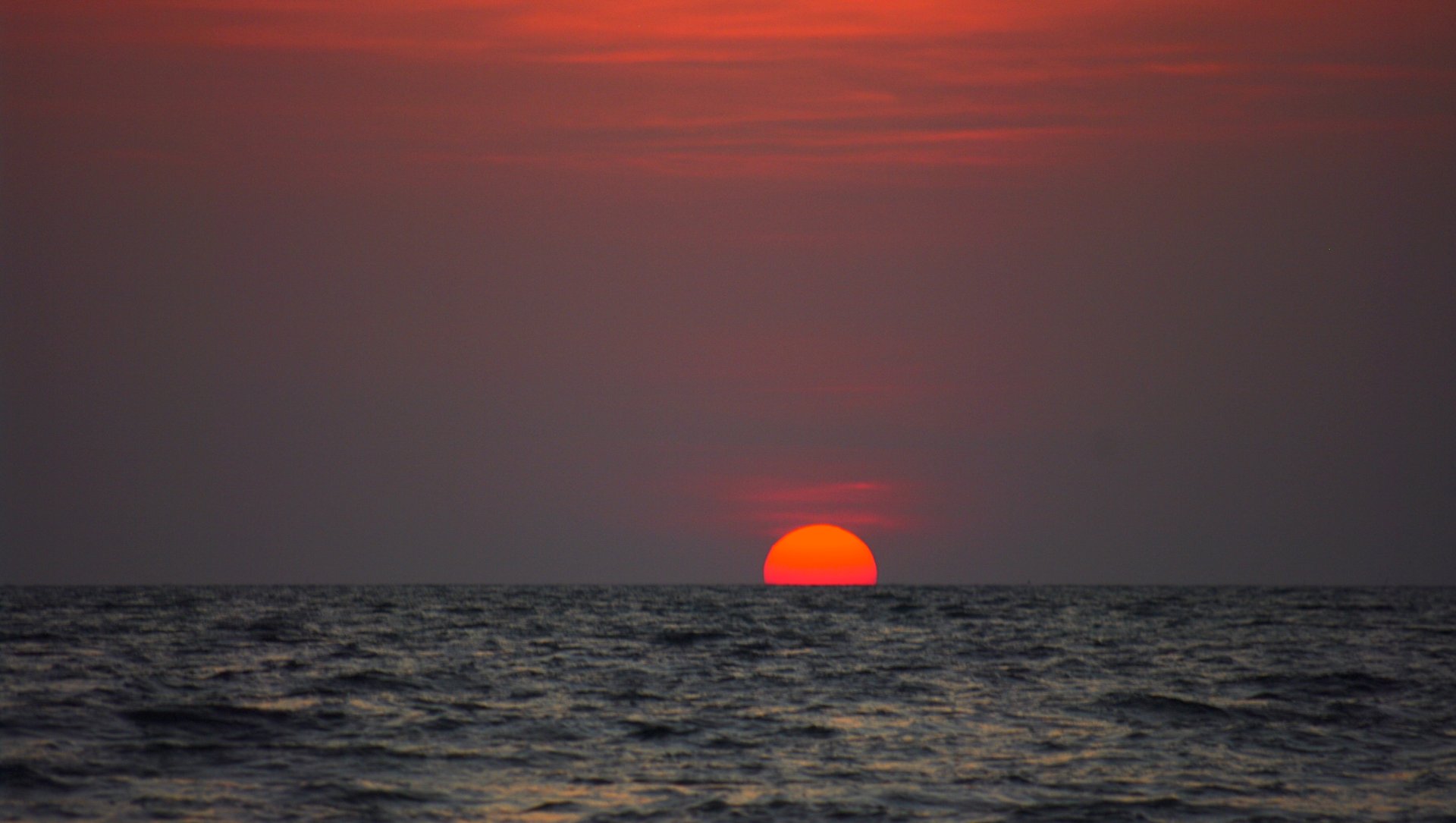 Sunset over the Andaman Sea at Pansand Resort, Koh Bulon-Lae